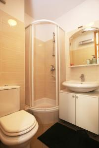 Kylpyhuone majoituspaikassa Apartment Iva
