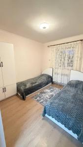 เตียงในห้องที่ Sevan Hotel Дом отдыха