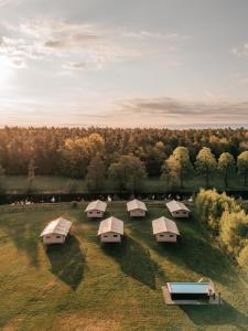 an aerial view of a group of tents in a field at Liva Park Nature Resort in Liwa