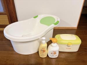 a bidet and a container with soap and other products at 民宿ひだまり Minsyuku Hidamari 美観地区徒歩4分 一棟貸切 無料駐車場あり 最大5名 in Kurashiki +33 photos