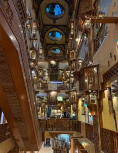 an overhead view of a shopping mall with lights at Kuwait Palace Hotel in Kuwait