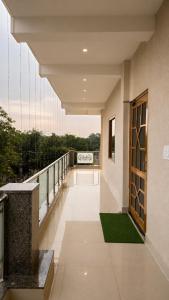 a view from the balcony of a building at The Grand Girivar Vrindavan # Lavis & Luxury Rooms # in Vrindāvan +9 photos