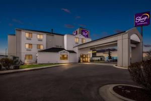 a rendering of the exterior of a hotel at night at Sleep Inn Nampa near Idaho Center in Nampa