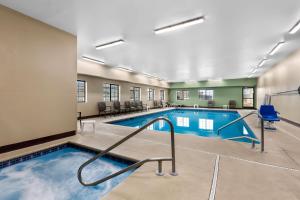 a pool with a slide in a building at Sleep Inn Nampa near Idaho Center in Nampa