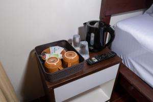 a tray with a coffee maker and a blender on a table at Royal Indah Glamping Kintamani in Kintamani
