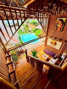 an overhead view of a house with a swimming pool at The Kokomo Siargao in General Luna