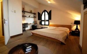 Postel nebo postele na pokoji v ubytování Nine Hotel