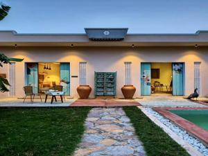 a home with a solarium on the roof at DanCenter Parijat Villas & Suites Udaipur in Udaipur