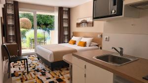 Køkken eller tekøkken på Forme-hotel & Spa Montpellier Sud-Est - Parc Expositions - Arena