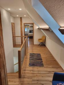 a staircase in a house with a blue ceiling at Ferienhaus Vitabene in Hollenstein an der Ybbs