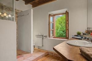 a bathroom with a sink and a window at Casa Del Tesoro in Triongo +47 photos