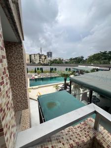 a view of a swimming pool from a building at Mac Residence in Lagos