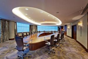 a large conference room with a long table and chairs at HILTON Residence of LUXURY 5 STARS apartment F1 in Baku +93 photos