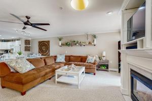 a living room with a couch and a table at B BY THE C in Ocean City