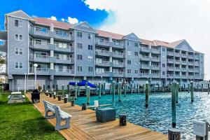a large apartment building next to a body of water at White Marlin 303B in Ocean City