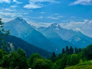 a view of a mountain range with trees at Beghela in Glola