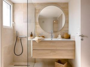 a bathroom with a sink and a mirror at Studio "Bulle de Sainte-Baume" in Plan dʼAups