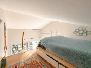 a bedroom with a bed and a window at Studio "Bulle de Sainte-Baume" in Plan dʼAups