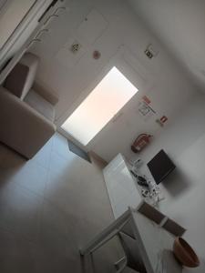 an overhead view of a room with a window at Casa Cabeça in Macedo de Cavaleiros