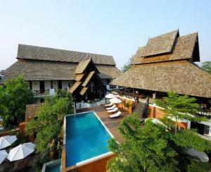 an aerial view of a resort with a swimming pool at Sunday Rainforest Chiangmai Hotel in Chiang Mai