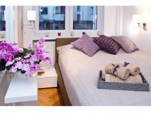 Posteľ alebo postele v izbe v ubytovaní Srebrna Warsaw Apartment