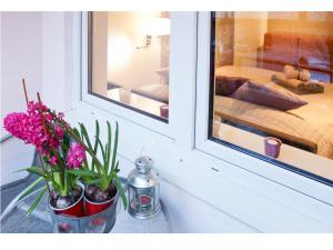 Posteľ alebo postele v izbe v ubytovaní Srebrna Warsaw Apartment
