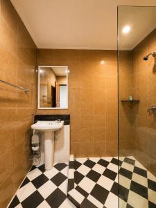 a bathroom with a sink and a shower at SaintLove Hotel in Chiang Mai +22 photos