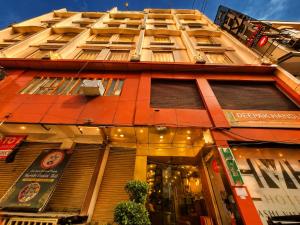 a store front of a building with a window at HOTEL LUXURY KASHI VISHWANATH- VARANASi in Varanasi