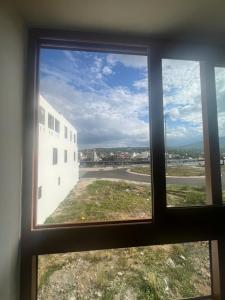 a view from a window of a building at Minh's homestay in Long Bình