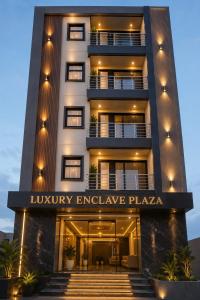 a building with a sign that reads luxury embassy exchange plaza at The- Luxury Enclave Plaza Near IGI Airport Delhi in New Delhi