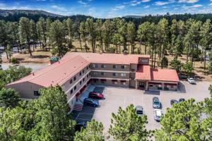 an overhead view of a building with cars parked in a parking lot at Comfort Inn & Suites Midtown in Ruidoso