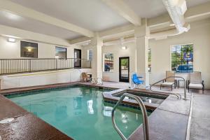 a swimming pool in a house at Comfort Inn & Suites Midtown in Ruidoso