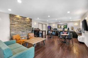 a living room with a couch and a table at Quality Inn in Helen