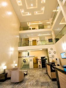 a living room with a couch and a table at Corporate Residence in Port Harcourt