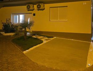 an empty basketball court in front of a house at Studio 28 in Kobiljak Sesvetski