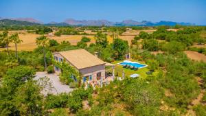 an aerial view of a house with a pool at Mercader in Alcudia