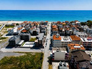 an aerial view of a city next to the ocean at D4 Apartments Paralia No-5 in Paralia Katerinis
