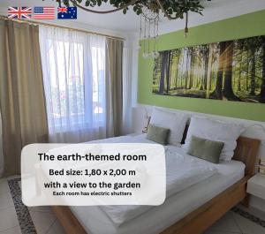a room with a bed with a sign on it at Dreamly Suites Oslip in Oslip