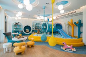 a childs play room with a large play area at Meliá Pattaya Hotel in Pattaya