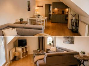 a living room with a couch and a kitchen at Ferienwohnungen Blischke in Carolinensiel