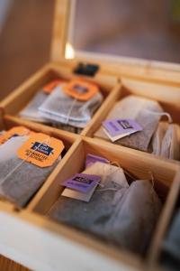 a wooden drawer filled with different types of ties at PrimeBnb Bad Hersfeld in Bad Hersfeld