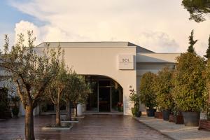 a building with a sign that reads at SOL by Meliá Tropikal Durres in Durrës