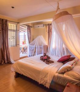 Ένα ή περισσότερα κρεβάτια σε δωμάτιο στο Blue Lagoon Villa