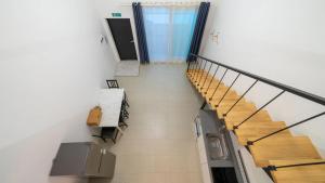 an overhead view of a staircase in a building at GaPyeong Yeoldudal Spapension&Camping in Gapyeong