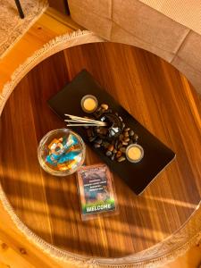 a table with a tray of food on a table at Komovi Luxury Sunset in Andrijevica