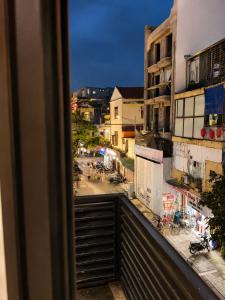 a view of a city street from a balcony at Hanoi Silk Crown Boutique Hotel & Spa in Hanoi