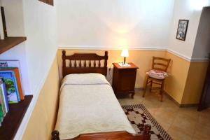A bed or beds in a room at Nonna Murtas