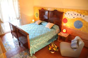 
Ein Bett oder Betten in einem Zimmer der Unterkunft Albergo Ristorante Cavaliere
