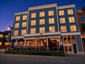 a large building with a play hotel on the street at Park Hotel Condominiums in Park City