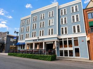 a large blue building on a city street at Park Hotel Condominiums in Park City +6 photos